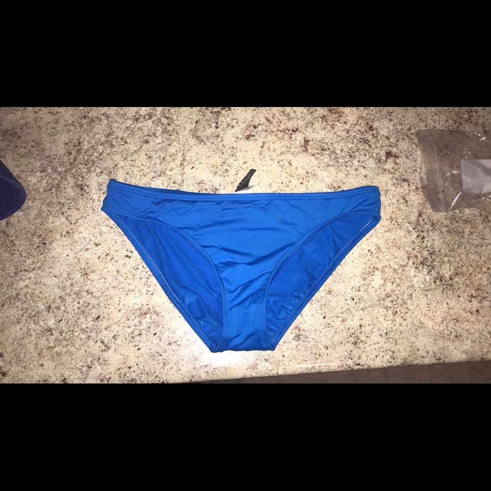 Blue bikini style bathing suit bottoms